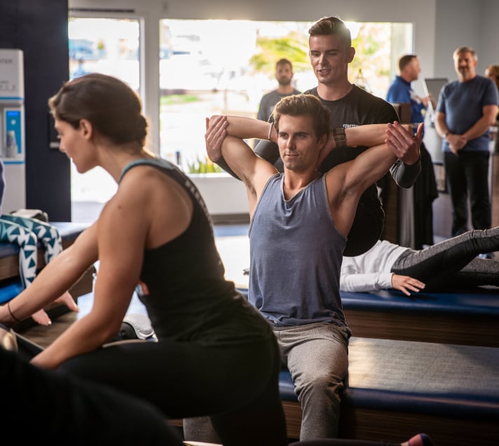 Group stretching at StretchLab